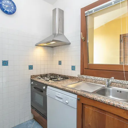 With Air Conditioning And Private Outdoor Area Just 400 Meters From The Costa Rei