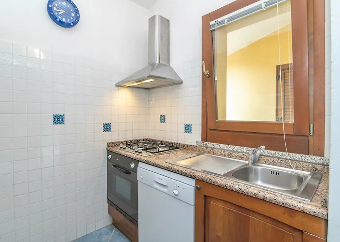 With Air Conditioning And Private Outdoor Area Just 400 Meters From The Costa Rei